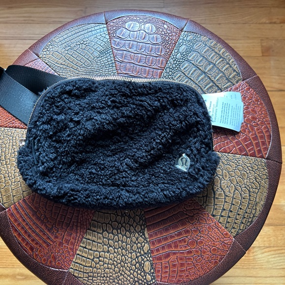lululemon athletica Handbags - Lululemon BRAND NEW with tags, black felt belt bag.